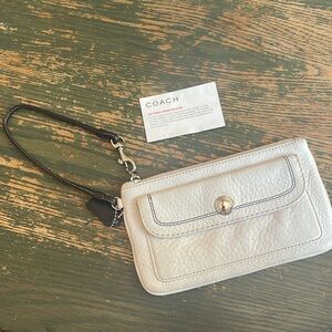 Coach white and black soft Pebbled leather wristlet